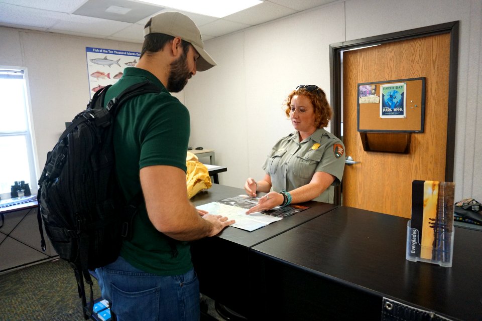 Ranger Helen orienting a visitor
