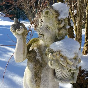 Stone snow stone figure photo