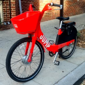 Jump Mobility locked to a street sign (early belt drive version) photo