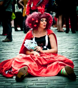 Performers make up costumes