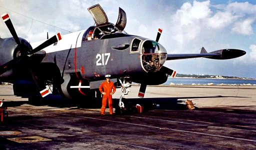 Lockheed Neputune MLD Probably on Bermuda. A very cool picture probably from a petty officier posing in front for his Neptune. Maybe not the most beautiful aircraft photo around. But how cool can you be, iff you stood on the picture? photo