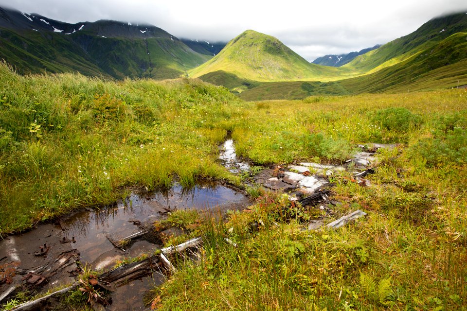 Military infrastructure remains and view of Jarmin Pass, Attu