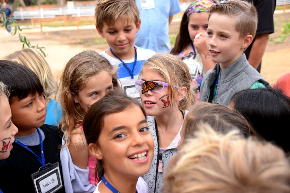 Then the monarch landed on this student's glasses!