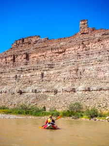 View of cliff wall from river photo