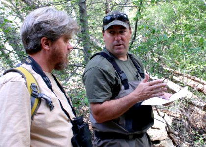 Chris Dellith, a senior fish and wildlife biologist with the U.S. Fish and Wildlife Service, discusses unarmored threespine sticklebacks with Tim Hovey, a senior environmental scientist, specialist, with the California Department of Fish and Wildlife. photo