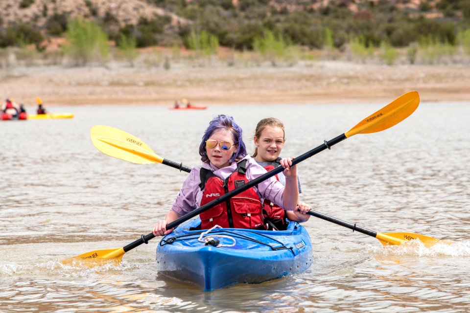Paleo Campers paddled kayaks at Ken's Lake near Moab, UT.