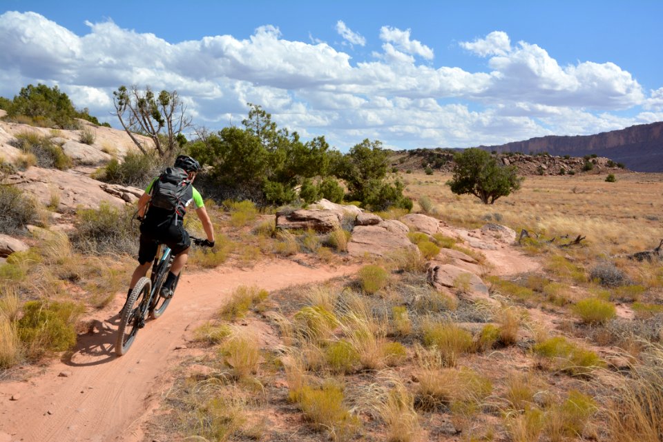 A man cruises down the Bar M Trails