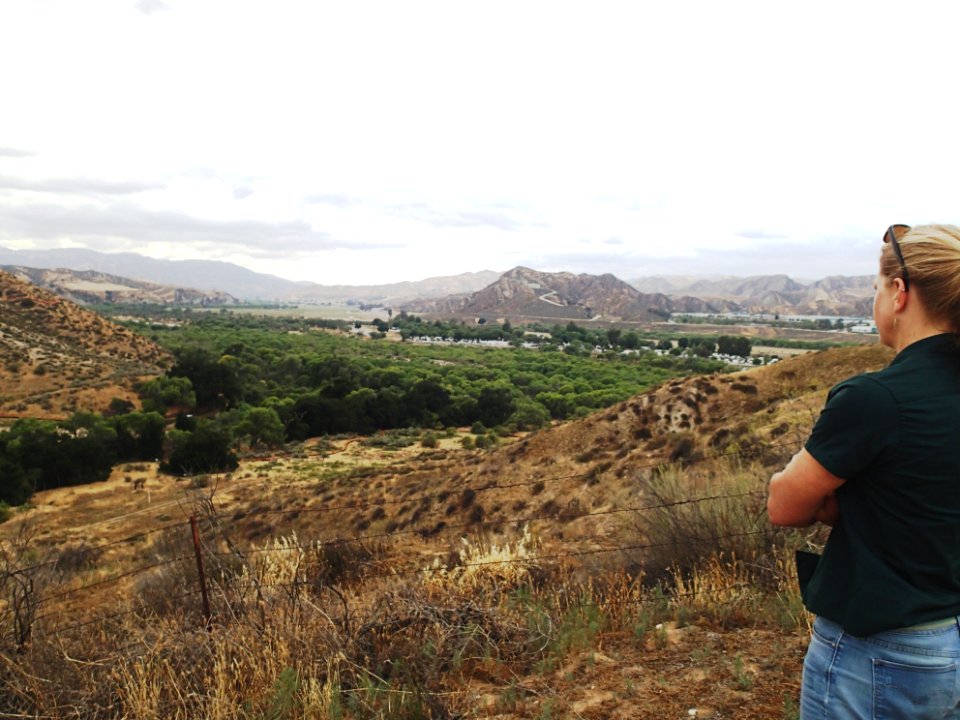 Cat Darst with the U.S. Fish and Wildlife Service overlooks parts of the Santa Clarita Valley from Newhall Ranch in Los Angeles County