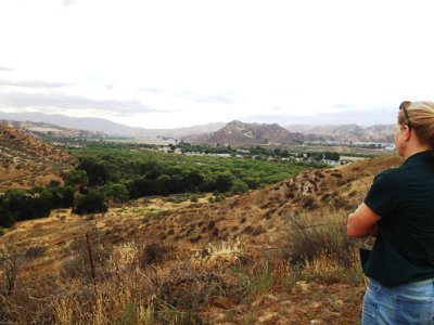 Cat Darst with the U.S. Fish and Wildlife Service overlooks parts of the Santa Clarita Valley from Newhall Ranch in Los Angeles County