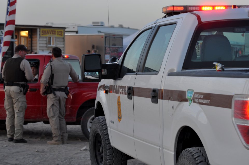 Law Enforcement Greeting a Visitor