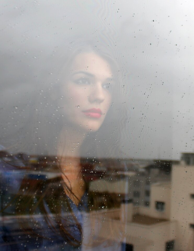 Behind glass window