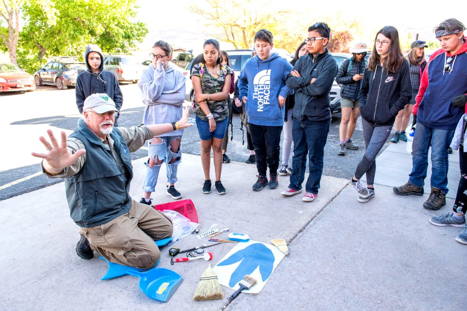 BLM Paleontologist Brent Breithaupt prepares the students for a day of dino-tracking. Moab, UT. Photo by Eric Delphenich