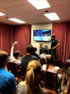 Wildland Firefighter Mac Zimmerman described fire ecology and fire program careers at Flaming Gorge STEM Day. Flaming Gorge Dam, UT. Photo by BLM Utah