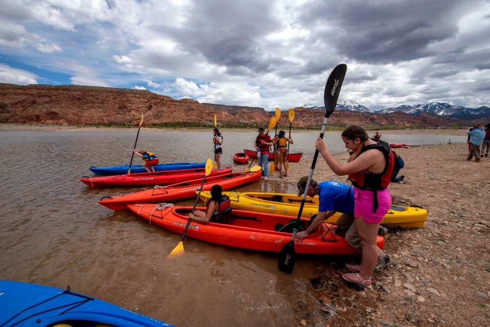 Campers take to the water at Ken's Lake, near Moab, UT. Photo by Eric Delphenich