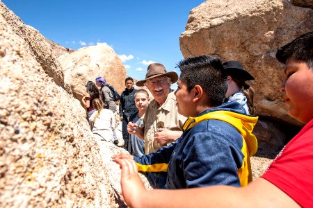 BLM Paleontologist Dr. Greg McDonald taught the students about Utah's unique geology at Cleveland-Lloyd Dinosaur Quarry in Jurassic Nat'l Monument. Photo by Eric Delphenich