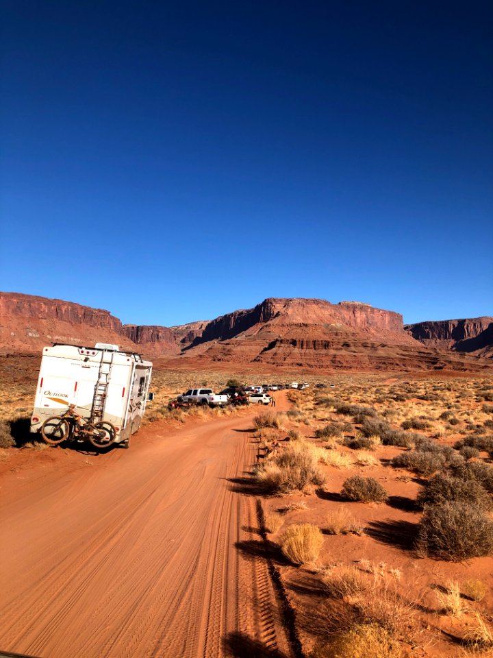 Vehicles Parked on Vegetation near the Monolith site