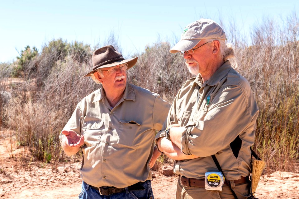 BLM Paleontologists Dr. Greg McDonald and Brent Breithaupt at Paleo Camp near Moab, UT. Photo by Eric Delphenich