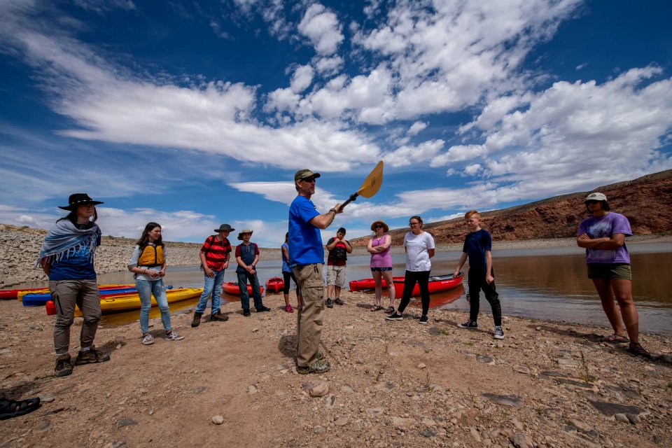 Outdoor Exploration teacher Cavett Eaton's kayak demonstration at Ken's Lake, a BLM rec site near Moab, UT. Photo by Eric Delphenich