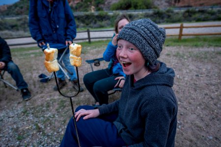 Roasting marshmallows at Camp. Dewey Bridge Campground, Moab, UT. Photo by Eric Delphenich