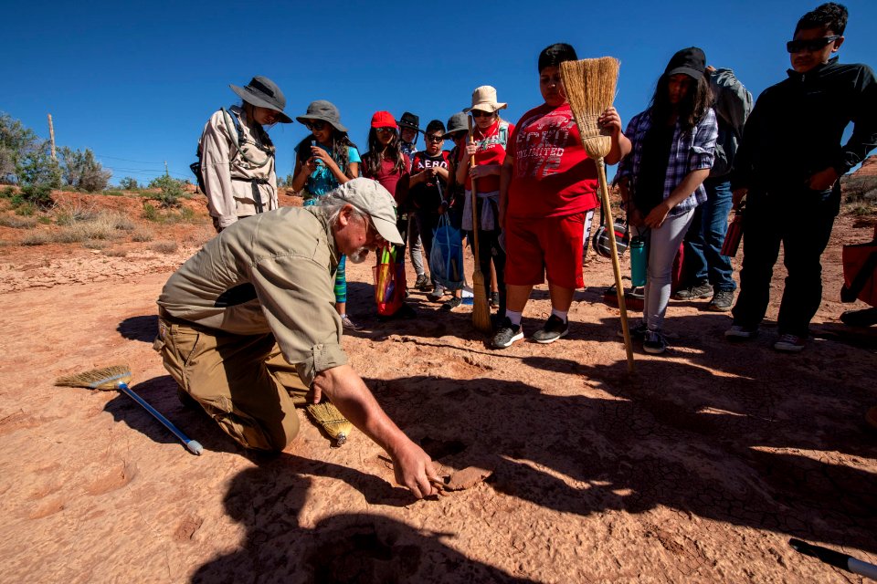 Dino Tracking with BLM Paleontologist Brent Breithaupt. Moab, UT. Photo by Eric Delphenich