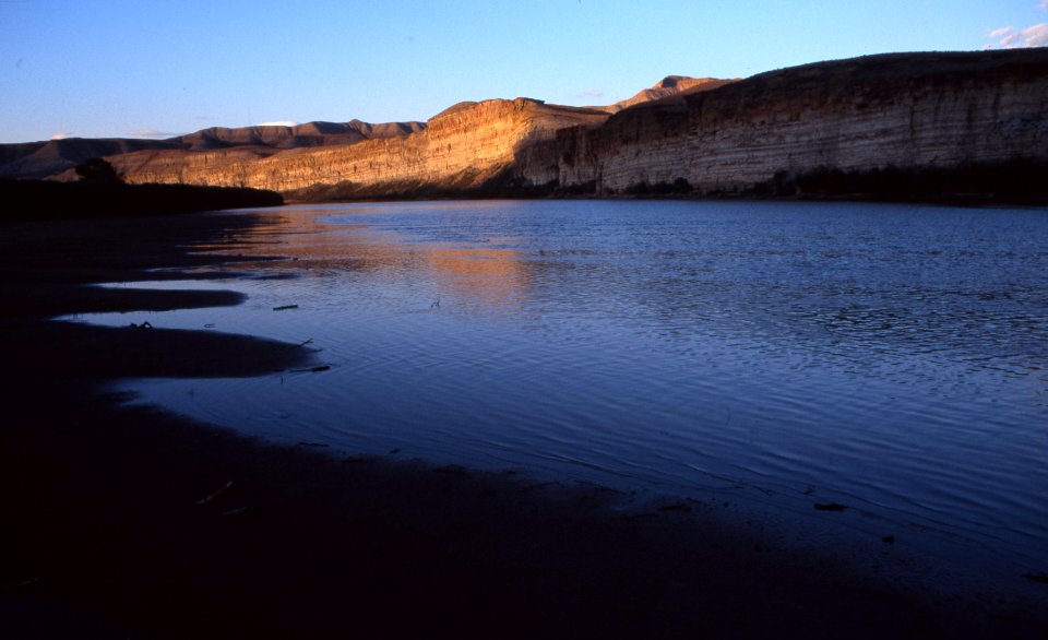 Shadows falling over beach along the Green River