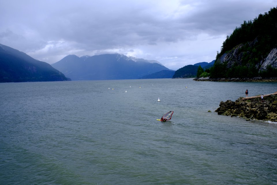 Windsurfer w hydrofoil on a stormy day