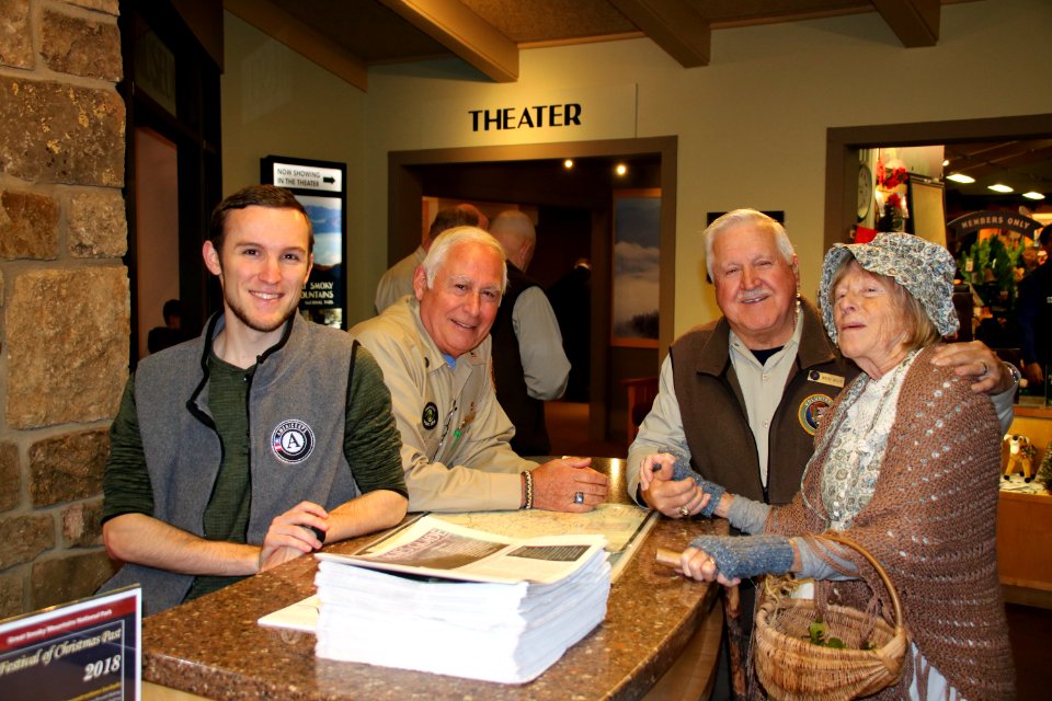 AmeriCorps Crew Member Erin Waddell, Volunteer Pat Carbone, Volunteer Wayne "Sarge" Wolfe, and Volunteer Frances Hensley at the 2018 Festival of Christmas Past, December 8, 2018--Warren Bielenberg