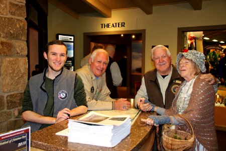 AmeriCorps Crew Member Erin Waddell, Volunteer Pat Carbone, Volunteer Wayne "Sarge" Wolfe, and Volunteer Frances Hensley at the 2018 Festival of Christmas Past, December 8, 2018--Warren Bielenberg