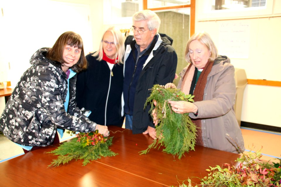 Visitors make wreaths at the 2018 Festival of Christmas Past, December 8, 2018--Warren Bielenberg