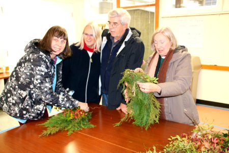 Visitors make wreaths at the 2018 Festival of Christmas Past, December 8, 2018--Warren Bielenberg