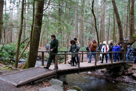 Volunteer Grant Palmer leads visitors on the Christmas Memories Walk at the 2018 Festival of Christmas Past, December 8, 2018--Warren Bielenberg