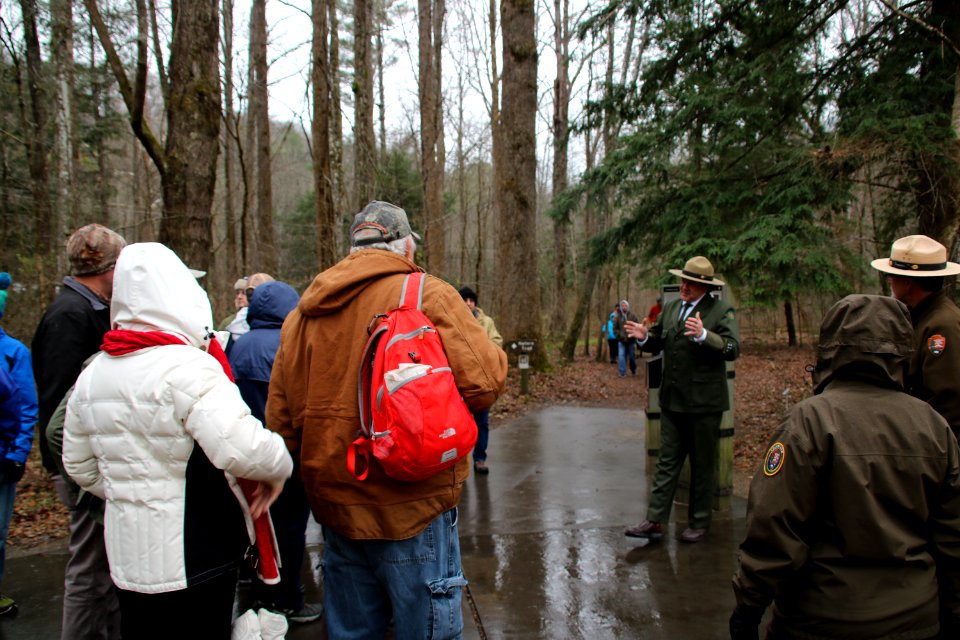 Volunteer Grant Palmer (as first superintendent Ross Eakin) talks to visitors on the Christmas Memories Walk at the 2018 Festival of Christmas Past, December 8, 2018--Warren Bielenberg