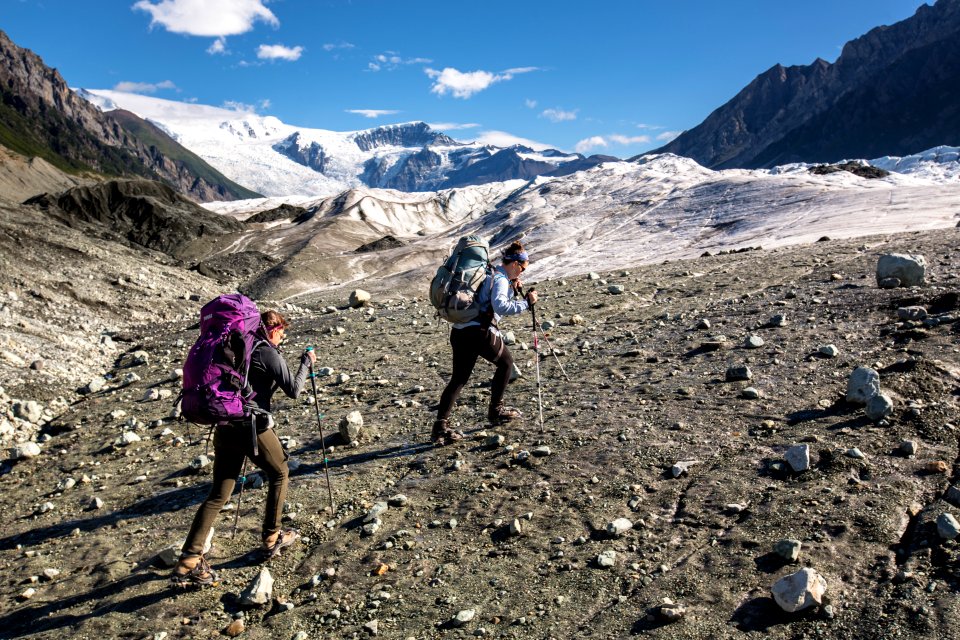 Backpackers Stepping onto the Root Glacier