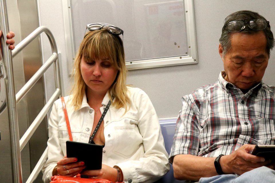 NYC Subway - reading books
