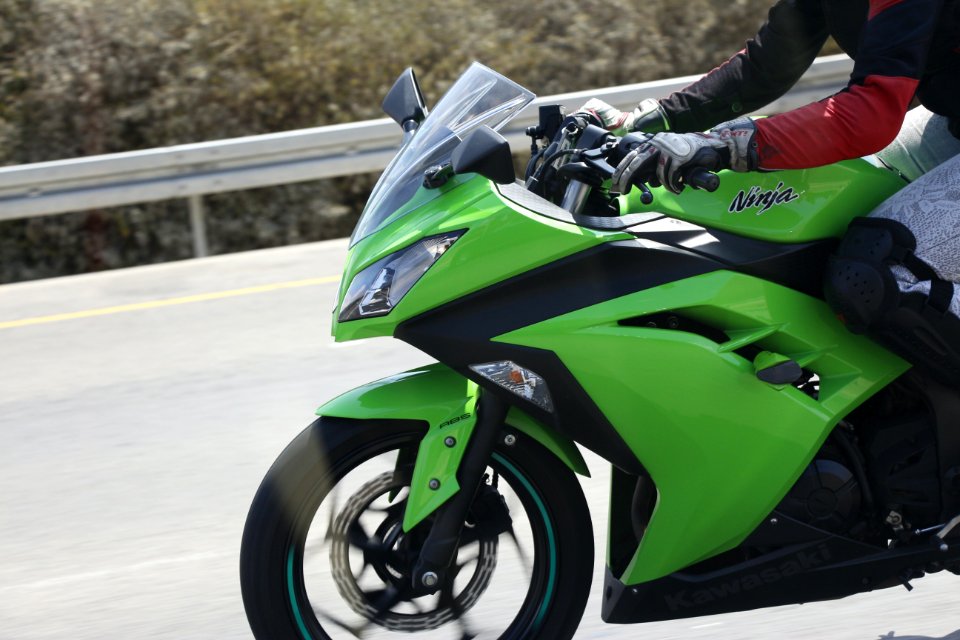 Along a Kawasaki Ninja at 100 MPH