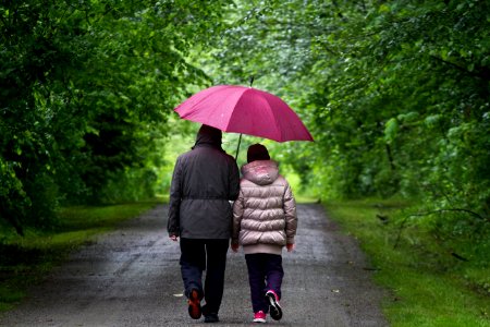 Walking in the rain at deer lake park photo