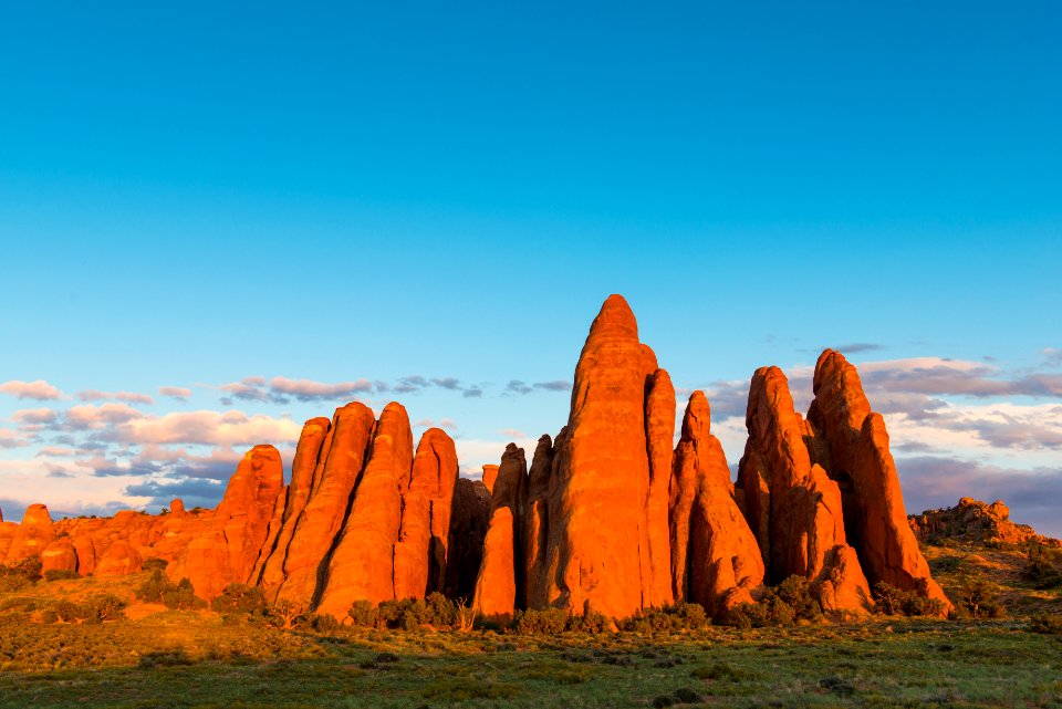 Sunset lights up the fins near Sand Dune Arch.