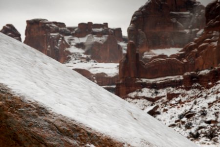 Sandstone slab dusted with snow.