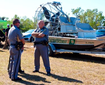 Collier County sheriffs Danny and Eddy with an FWC Law Enforcement airboat