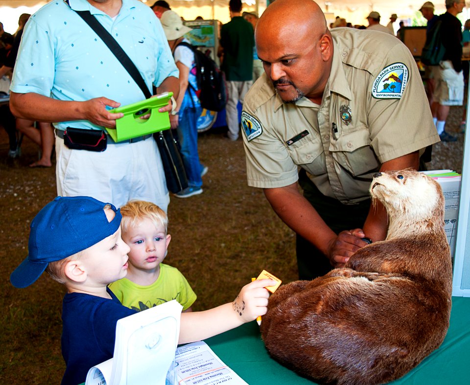Collier-Seminole Ranger Maulik tells Griffin and Murphy about otters