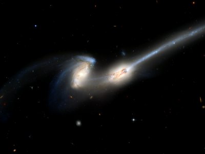 Hubble's newest camera takes a deep look at two merging galaxies
