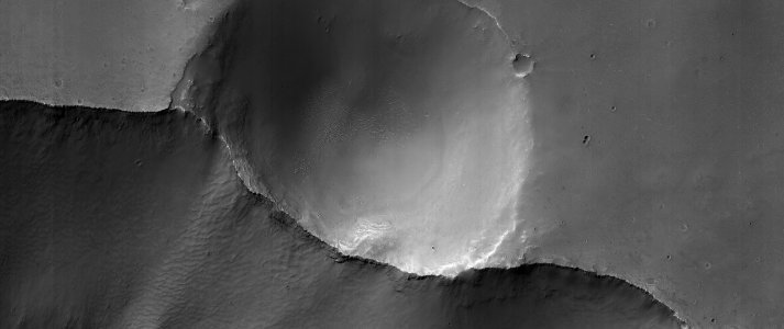 A Small Cut Crater in Capri Chasma