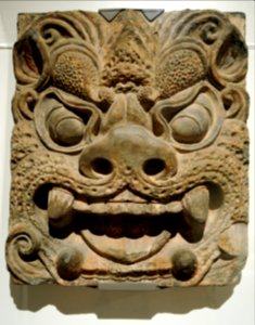 Ogre Mask, on brick, (or Zephr), molded terracotta, traces of paint, Tang dynasty (618-907), Xinuningsi pagota, Temple Where Contemplation Is Cultivated, Mount Qingliang, China - collection Art Institute, Chicago, Illinois, USA