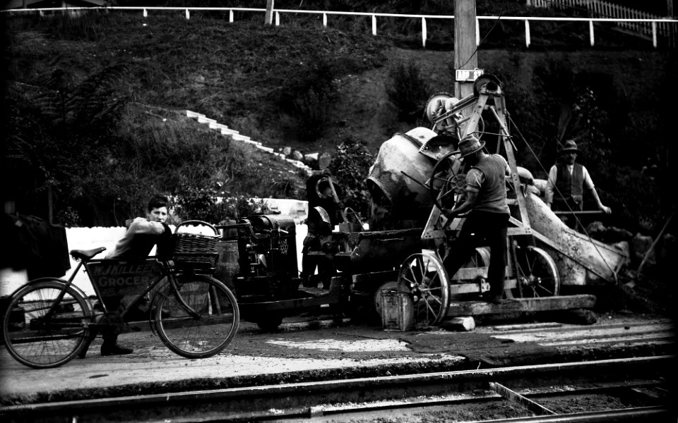 29; Aro Street, concrete being poured by workmen into tipper on Lister Truck - 13 Jun 1930