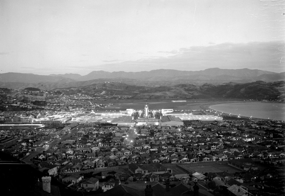 12; Elevated view Centennial Exhibition and Lyall Bay at night - Circa 1940
