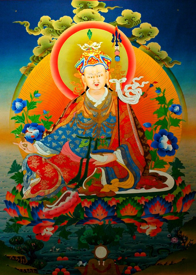 Painting of Padmasambhava, Guru Rinpoche seated on a moon lotus, with vajra, skullcup, khatvanga staff, blue lotuses, vulture feather hat, 7 robes,Tibetan Thangka, 8th Century Saint, from a shop in Bodha, Kathmandu, Nepal