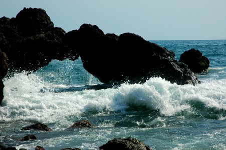 Water under the bridge, little rock arch, splash of the Pacific Ocean, South Mazatlan, Sinaloa, Mexico photo