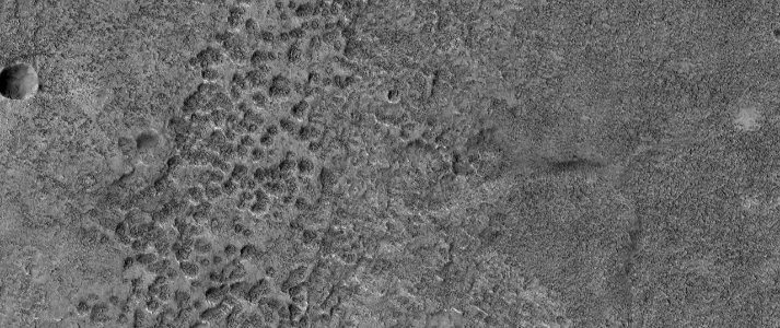 Pitted Material and Mounds in Chryse Planitia