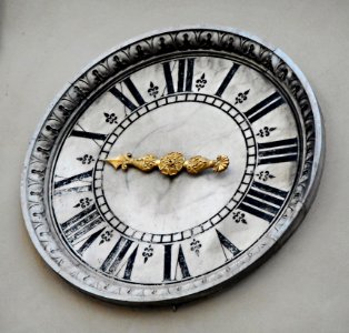 Wall clock, nearby Santa Maria del Fiore Basilica in Florence photo