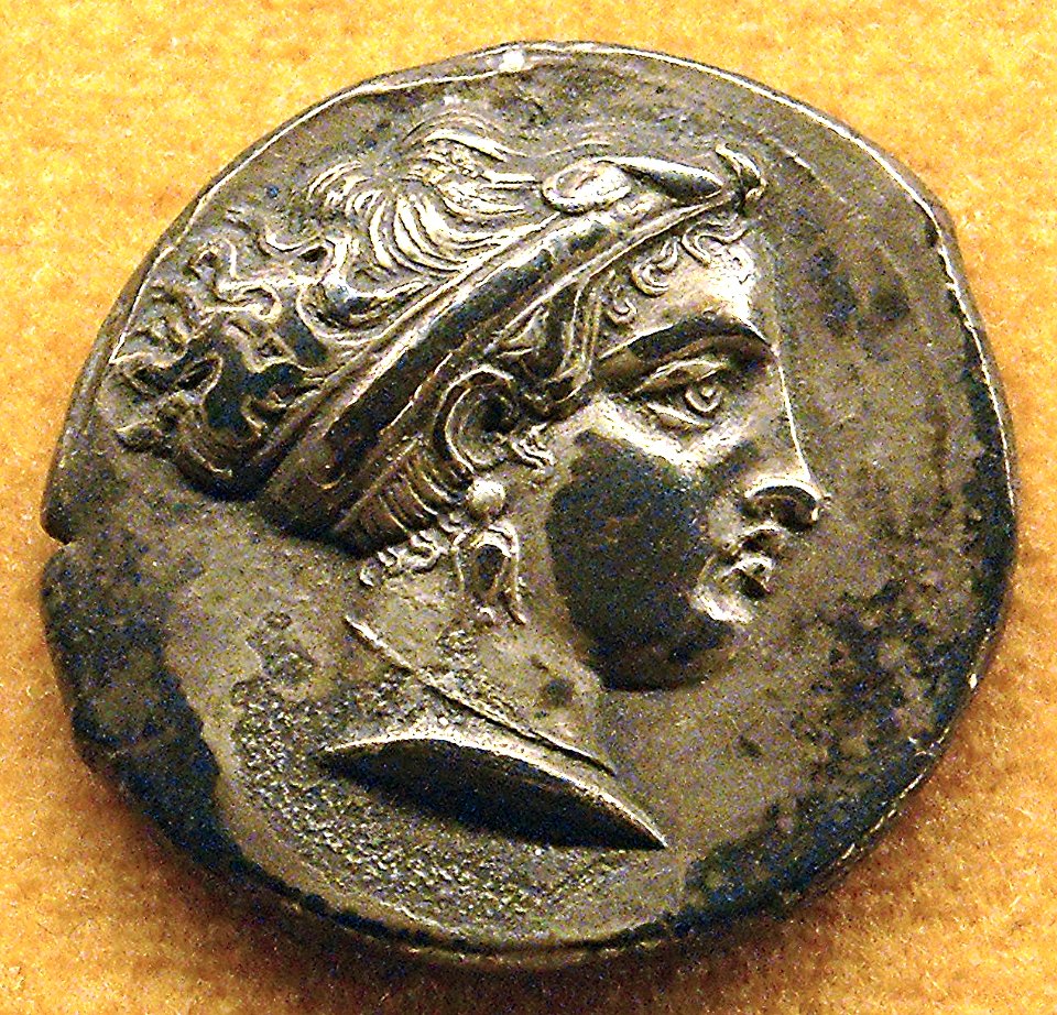 Silver coin of Neapolis / Naples with head of the Siren Parthenope (beginning 4th century BC) - Naples Archaeological Museum